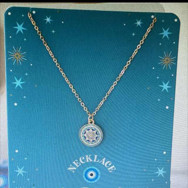 All seeing eye necklace on a greeting card