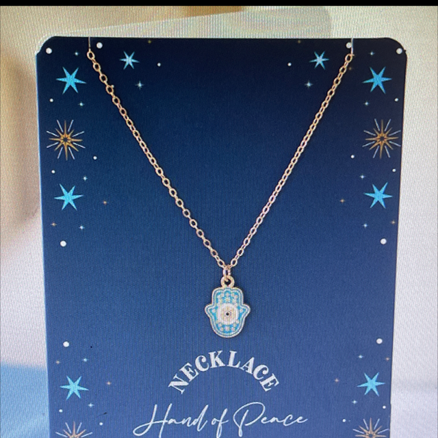 Hand of Hamsa necklace on a greeting card