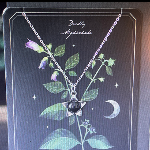 Deadly nightshade necklace with black obsidian on greeting card
