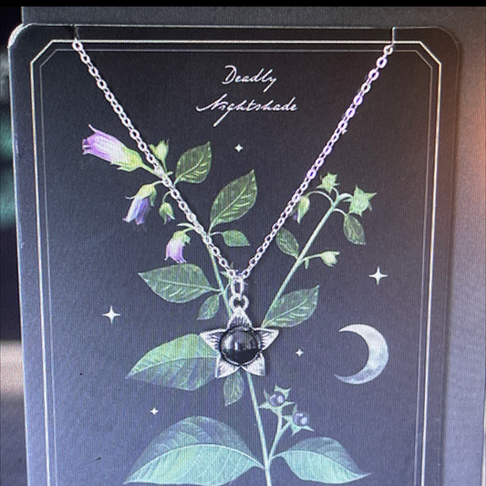 Deadly nightshade necklace with black obsidian on greeting card